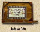 Choose from Challah boards and challah covers, Jewish clocks, tzedakah boxes and more!