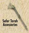 Rimonim, yads, mantels, aron kodesh curtains.